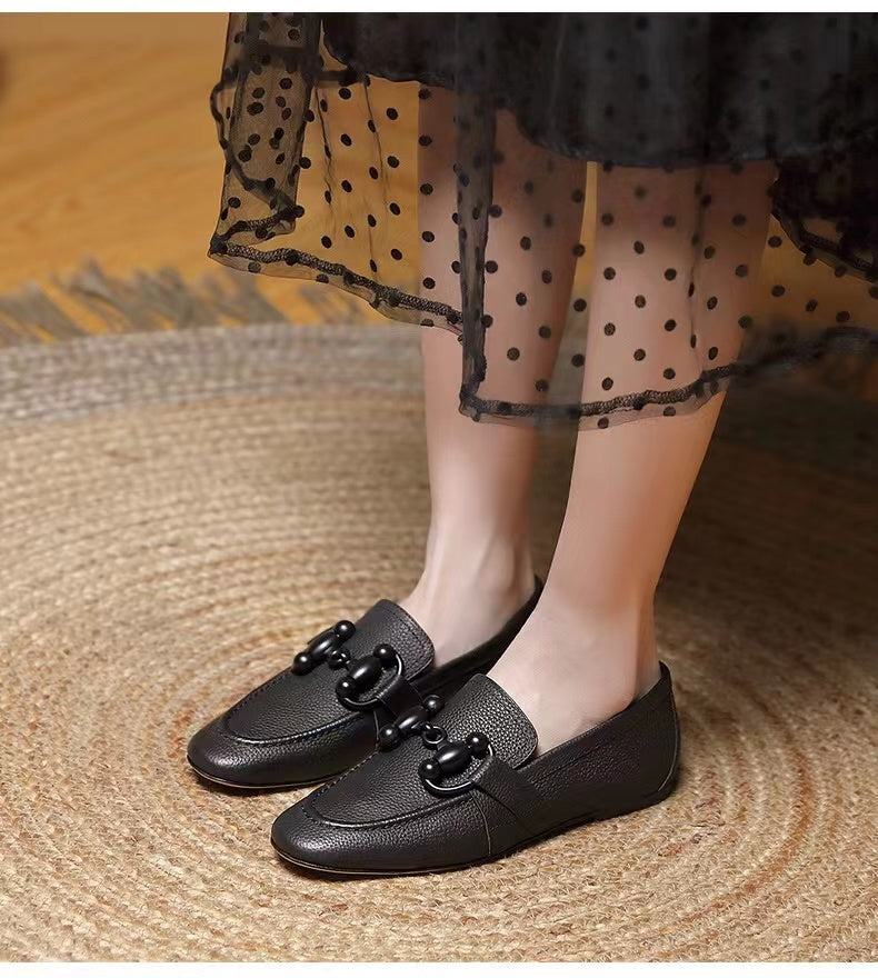 Square toed, metallic buckle, English style penny loafer shoes